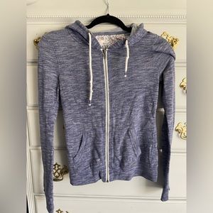 Garage size small faded purple zipper up sweatshirt.